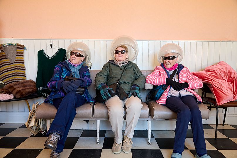Visitors enjoy a retro-style day out in Beamish's 1950s town recreation. 