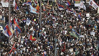 People attend a major anti-government rally to press their demand for an early election after nearly eight months of almost daily anti-corruption demonstrations