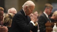 Former US President Joe Biden kneels in prayer during funeral services for Mark and Melissa Hortman at the Basilica of St. Mary in Minneapolis, Minn., on Saturday, June 28, 20