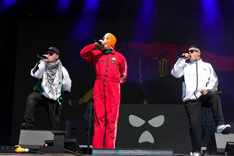 Kneecap perform during Glastonbury Festival in Worthy Farm