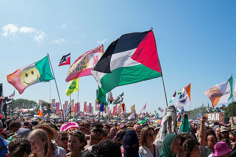 Many Palestinian flags were waved during Kneecap's performance 