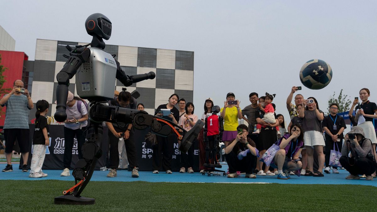 Photos: Humanoid robots in Beijing play a football match as China steps up AI plans
