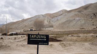 A signboard points the way to the newly relocated settlement of the abandoned Samjung village in the Mustang region.
