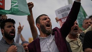 People shout slogans during a protest against satirical LeMan magazine after it published a cartoon allegedly depicting the Prophet Muhammad, in Istanbul, Turkey, 1.7.2025. 