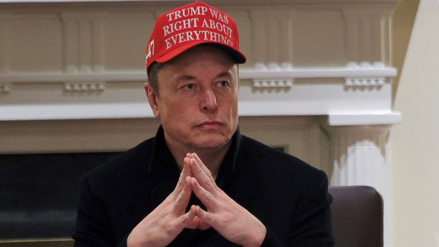 FILE - Elon Musk attends a cabinet meeting at the White House in Washington, 24 March 2025