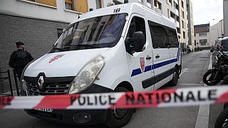 FILE: Police officers block a street in the French capital Friday, March 7, 2025 in Saint-Denis, outside Paris.
