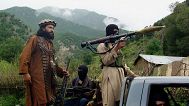Pakistani Taliban patrol in then their stronghold of Shawal in the tribal region of South Waziristan, 5 August, 2012