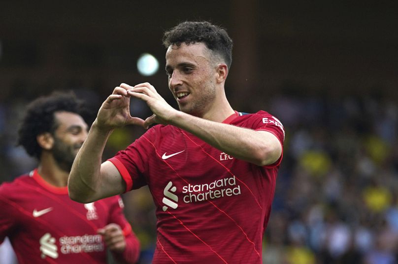 DOSSIER - Diogo Jota de Liverpool célèbre son but lors du match de Premier League à Carrow Road, Norwich, samedi 14 août 2021.