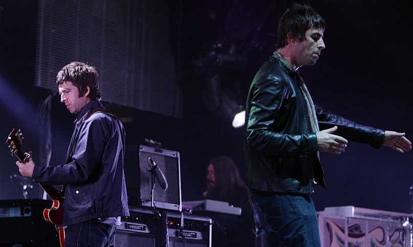 Noel, left, and Liam Gallagher, perform in Vancouver on 27 Aug. 2008