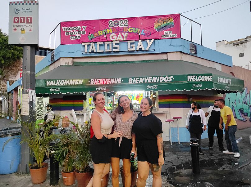 Sophie eating tacos with friends in Guadalajara.