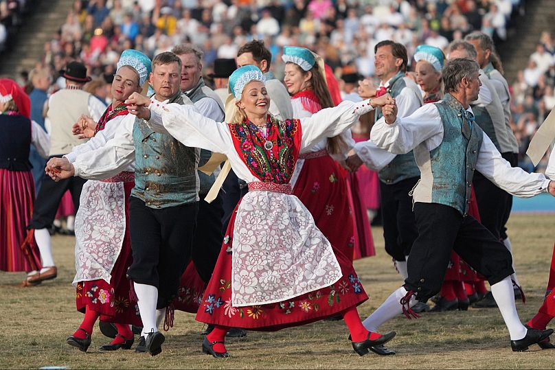 Participants making a song and dance out of celebrating in Estonia 