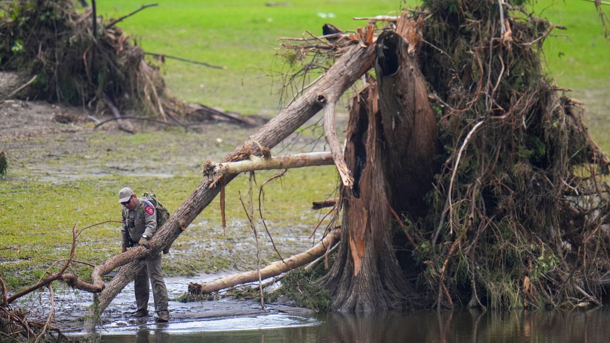 Families return to ruins after Texas flooding that left dozens dead