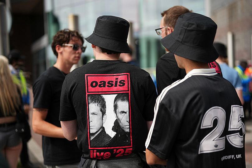 Oasis fans gather in Cardiff