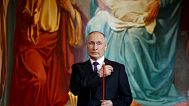 President Vladimir Putin crosses himself during an Orthodox Easter service in the Christ the Savior Cathedral, in Moscow, Russia, Sunday, April 16, 2023.