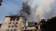 Rescue workers put out a fire of a building destroyed by a Russian drone strike in Zaporizhzhia, Ukraine, on Monday, July 7, 2025.
