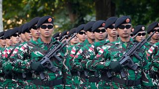 Indonesian troops march during a rehearsal for the upcoming Bastille Day parade, Wednesday, July 9, 2025, on the Champs-Élysées avenue in Paris. 
