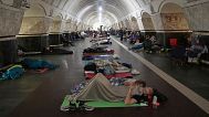 People rest in a metro station, being used as a bomb shelter, during a Russian attack in Kyiv, Ukraine, early Thursday, July 10, 2025.
