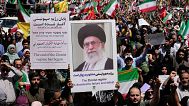 Iranian protestors carry portrait of the Supreme Leader Ayatollah Ali Khamenei and anti-Israeli signs during a protest in Tehran, 20 June, 2025