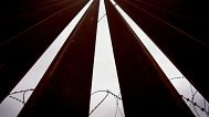 Concertina lines the interior of a border wall separating Mexico from the United States, 4 June, 2025