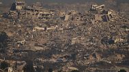 Buildings that were destroyed during the Israeli ground and air operations stand in northern of Gaza Strip as seen from southern Israel, Thursday, July 10, 2025.