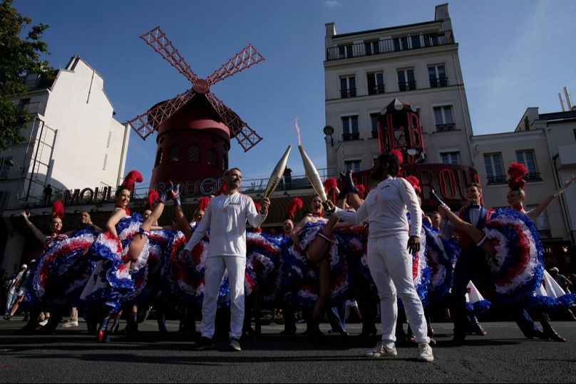 The famous Parisian landmark was prepared for photos during the Paris Olympic torchbearers parade.  