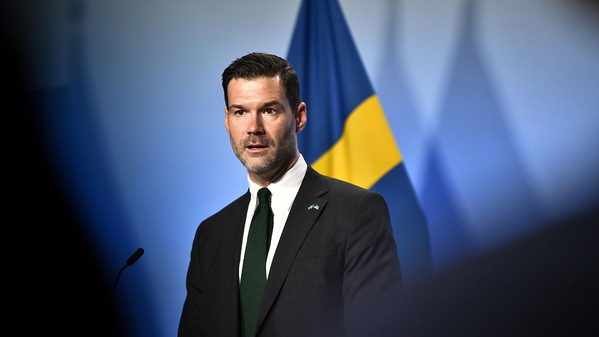 Swedish migration minister ‘shocked and horrified’ by teenage son’s far-right links