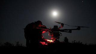 Servicemen prepare a Kazhan drone that delivers supply and carry heavy bombs near Chasiv Yar, 15 May, 2025