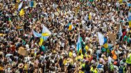 People gather during a mass demonstration against over tourism in Las Palmas de Gran Canaria, 20 August, 2024