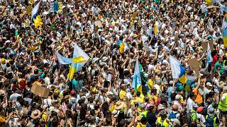 People gather during a mass demonstration against over tourism in Las Palmas de Gran Canaria, 20 August, 2024