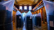 Beetle-infested books are placed in hermetically sealed plastic sacks from which all oxygen is removed. Pannonhalma, Hungary, Thursday, July 3, 2025