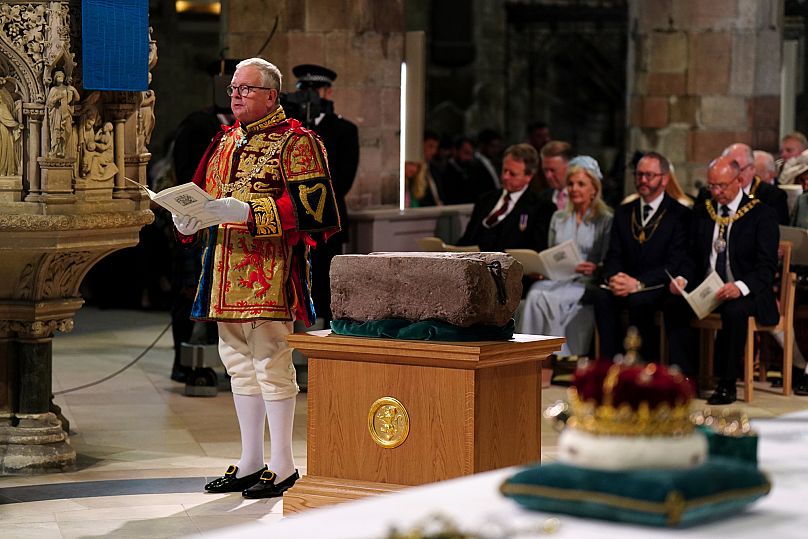 Lord Lyon King of Arms Joseph Morrow and the Stone of Destiny during an event at St Giles' Cathedral - 5 July 2023, in Edinburgh