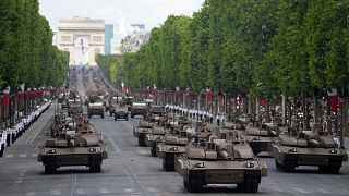 Leclerc tanks drive down the Champs-Élysées avenue during the Bastille Day parade in Paris, 14 July, 2025 
