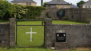 FILE - This June 4, 2014 file photo shows the site of a mass grave for children who died in the Tuam mother and baby home, in Tuam, County Galway, Ireland. 