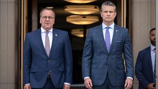 Secretary of Defense Pete Hegseth, right, stands with German Defense Minister Boris Pistorius during an honor cordon upon his arrival at the Pentagon, Monday, July 14, 2025, i