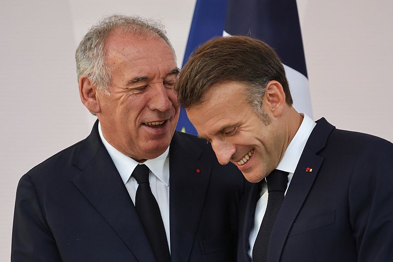France's Prime Minister François Bayrou President Emmanuel Macron at the end of an address to army leaders in Paris, 13 July, 2025