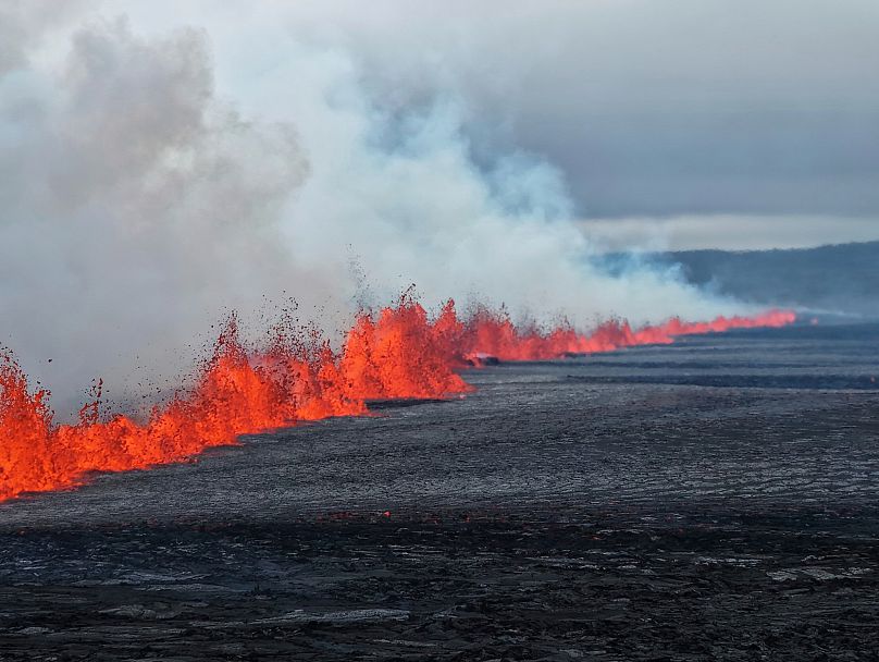 A view of the volcanic eruption by the Sundhnúkagigjarö íur volcano, in Grindavik, Iceland on Wednesday 16 July. 