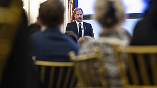 Prince Harry visits Angola in repeat of Diana's iconic 1997 trip.