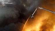 Crews tackle a fire caused by a Russian air strike in Vinnytsia, 16 July, 2025
