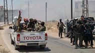 FILE: Syrian government forces gather at Mazraa village on the outskirts of Sweida city, southern Syria, 15 July 2025