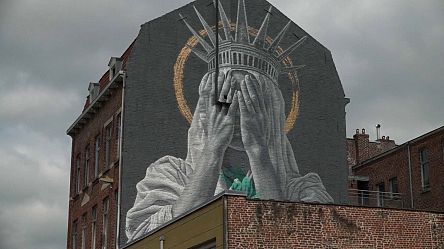 Giant mural in France critiques Trump's immigration policies