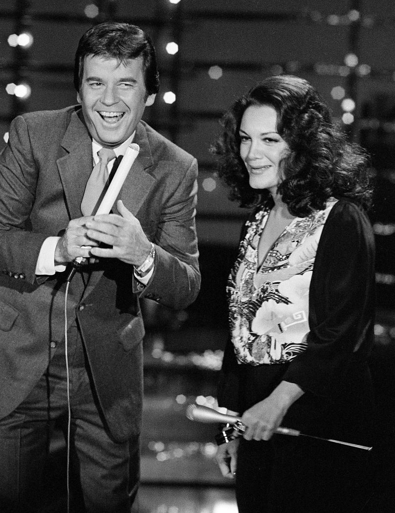 Dick Clark, host of American Bandstand, appears with Connie Francis during taping of the show in Los Angeles