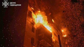A residential building burns following a Russian air attack in Odesa, Ukraine, Saturday, July 19, 2025.