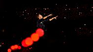 Chris Martin of Coldplay performs during the band's Music Of The Spheres World Tour at D. Y. Patil Sports Stadium in Navi Mumbai, Saturday, Jan. 18, 2025.