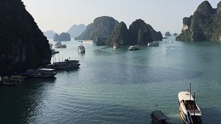 Tourist boats move in Ha Long Bay in Vietnam on 24 October 2015.