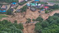 Houses collapsed from a landslide due to heavy rain are seen in Sancheong, South Korea, Saturday, July 19, 2025. 
