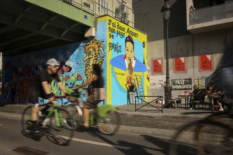 The mural is set in northeastern Paris, besides the Canal de l'Ourcq.