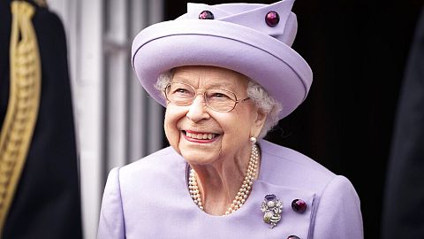 Queen Elizabeth II attends an armed forces act of loyalty parade in June 2022, shortly before her death.