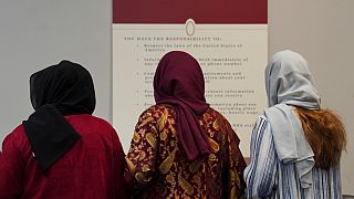 FILE: A group of female Afghan refugees gather for a class on self-care and a post-Ramadan celebration in Fredericksburg, Va., April 8, 2025