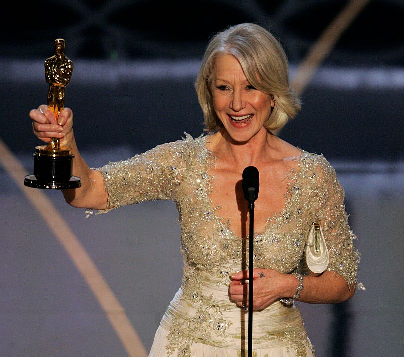 Helen Mirren accepts the Oscar for best actress for her work in 'The Queen' at the 79th Academy Awards, 25 February 2007 