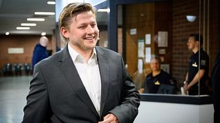 Comedian and satirist Sebastian Hotz, alias El Hotzo, attends the trial against him at Tiergarten district court, in Berlin, Wednesday, July 23, 2025.